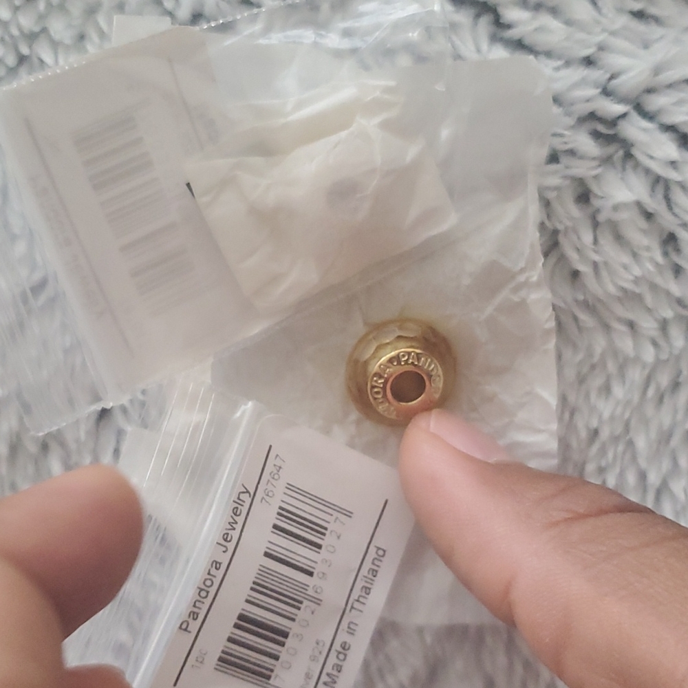 Pair of pandora shine 18k gold plated muranos